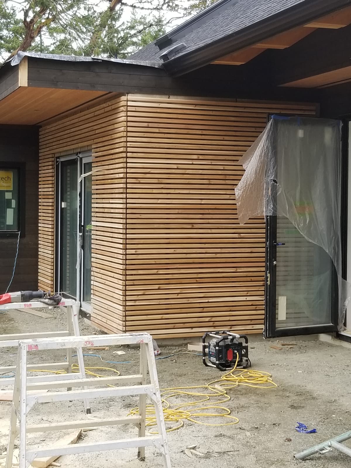 Wood siding exterior with natural finish