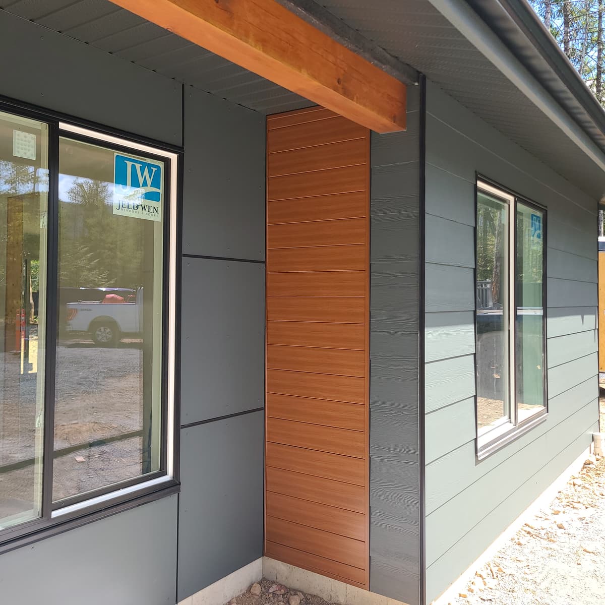 Wood panel accent with board and batten siding