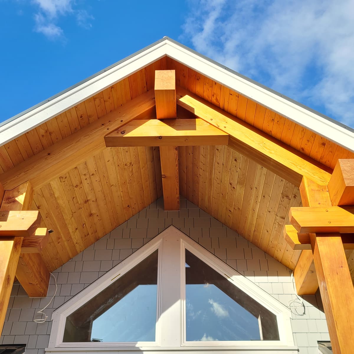 Cedar tongue and groove gable with timber beam details